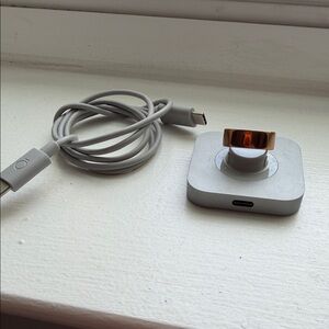 Oura size 7 Rose Gold Smart Ring with Charging Dock